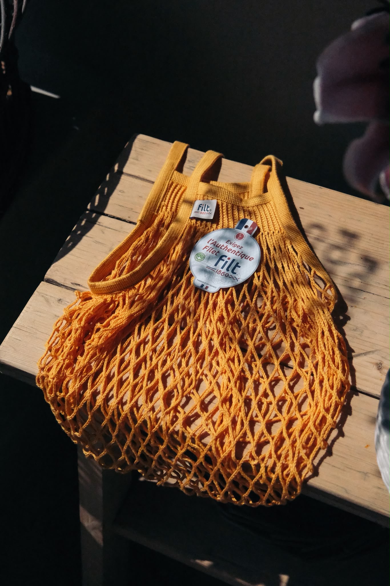 A yellow mesh bag
